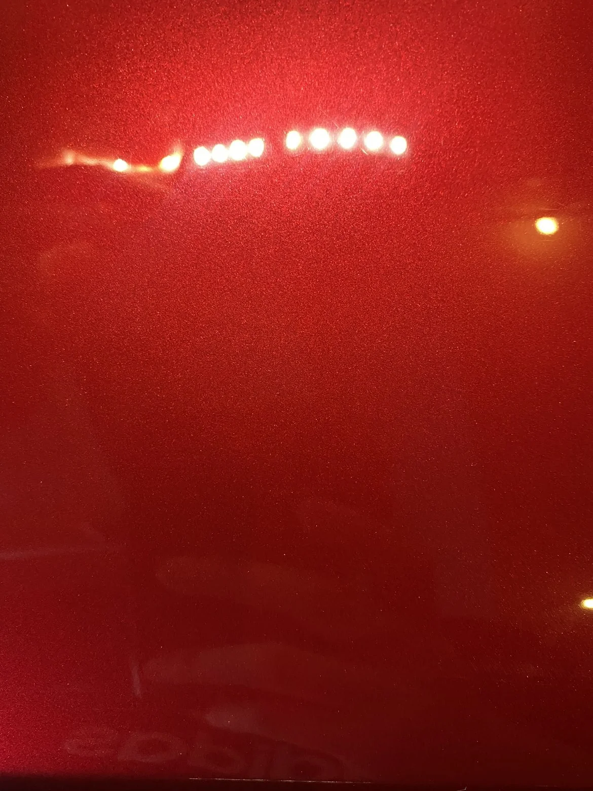 Red paint finish — close-up