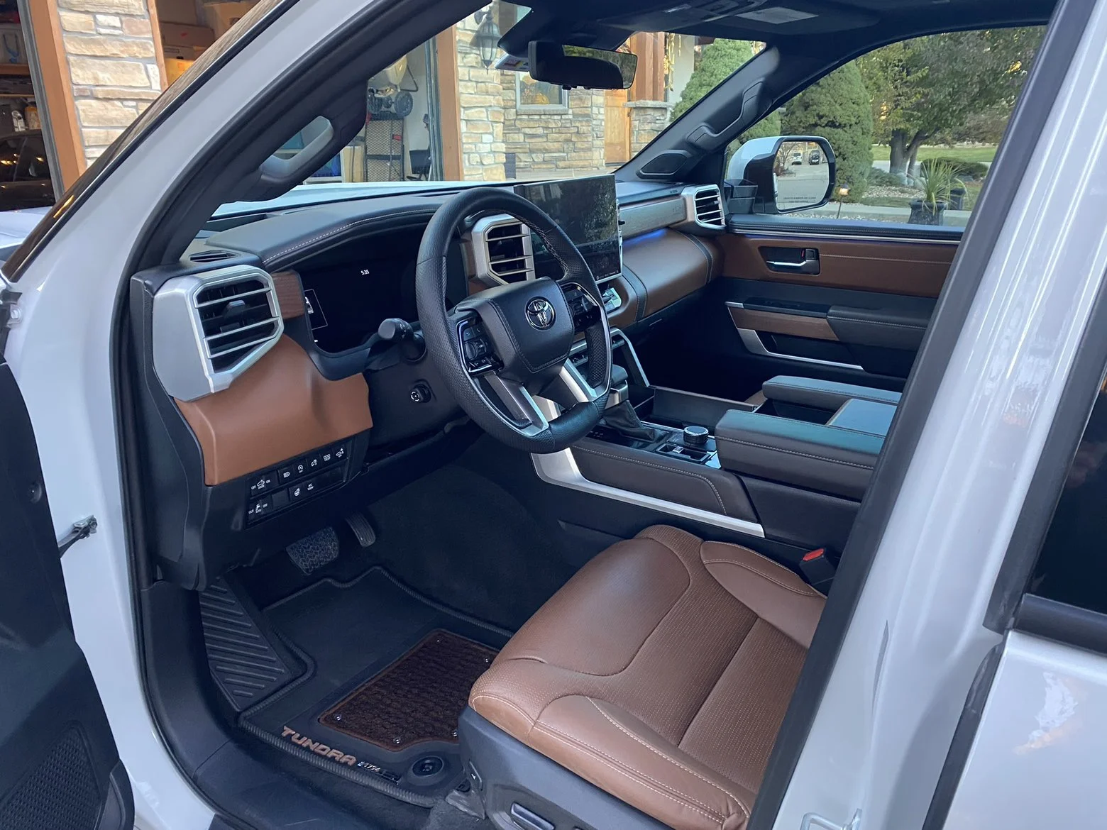 Clean truck interior with warm brown leather seats
